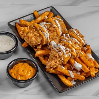 Fried tender over fries